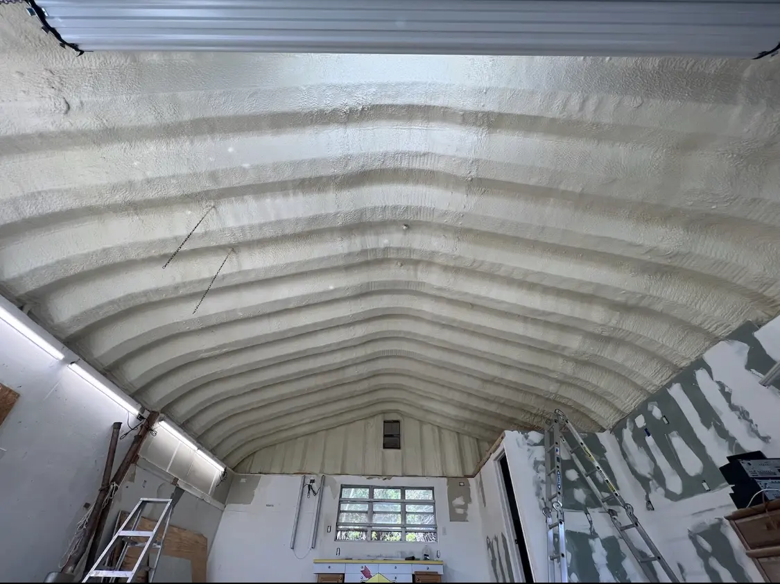 Spray polyurethane foam applied to the underside of a metal roof deck in Oroville East